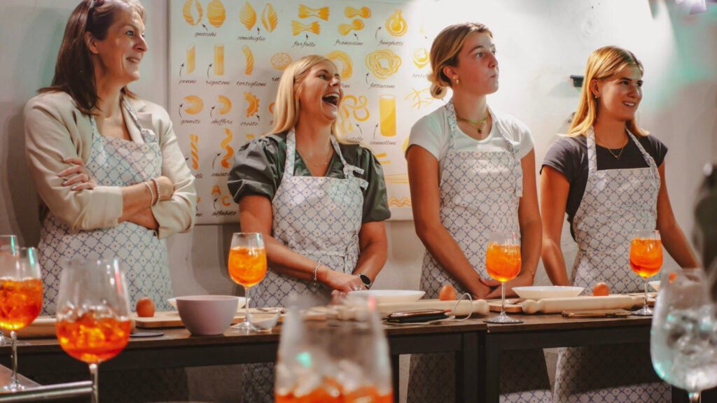 Group of young women on a Spritz & Spaghetti Cooking Class in Rome