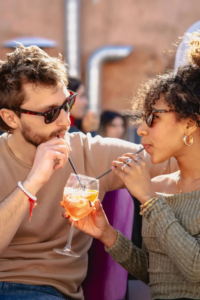 Couple enjoying Aperol Spritz on a Rome Tispy Tour