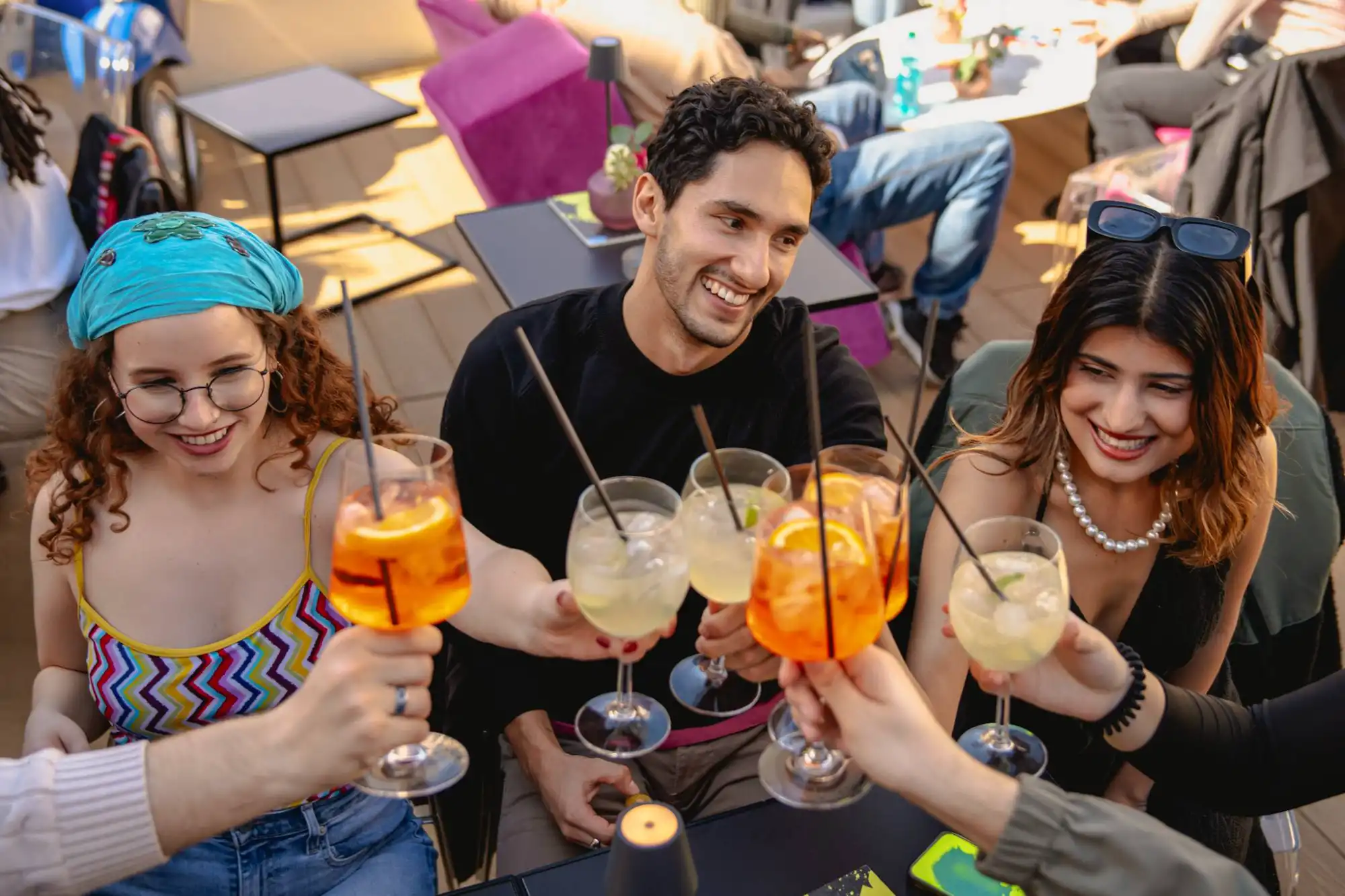 Young people enjoying Italian cocktails on a Rome Tipsy Tour