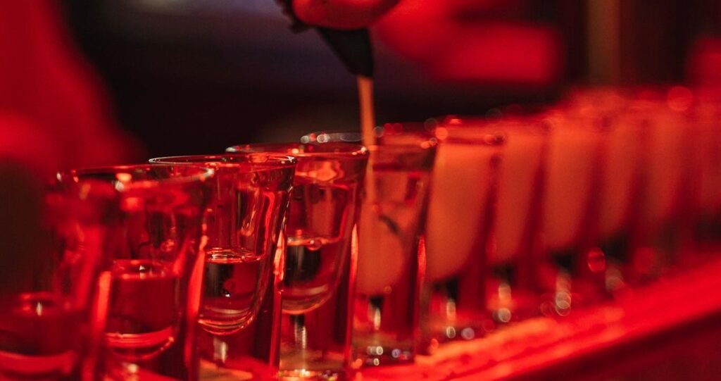 Line of shot glasses on the bar during a Lisbon Tipsy Tour