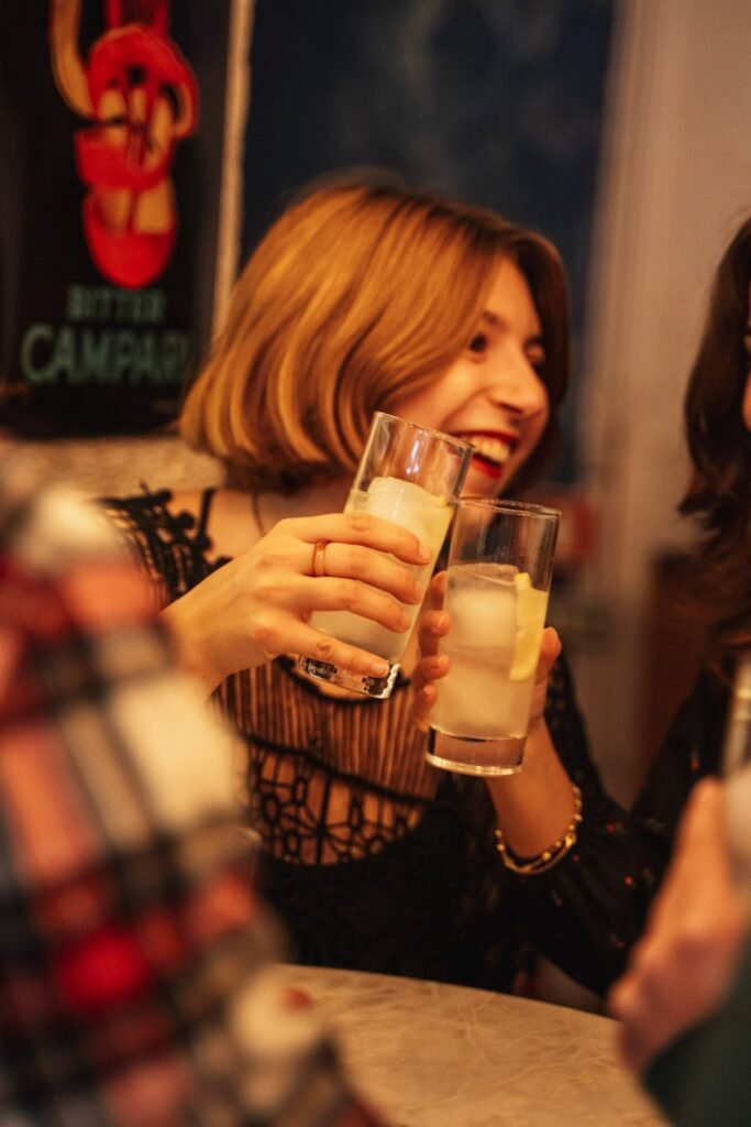 Young woman enjoying a drink on a Lisbon Tipsy Tour