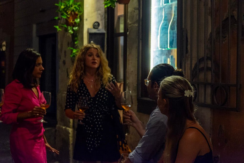 Sipping wine outside a bar in Monti in the midst of Rome nightlife