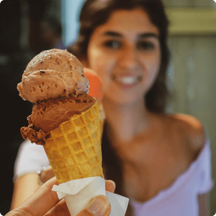 Girl enjoying gelato on a Rome Food Tour